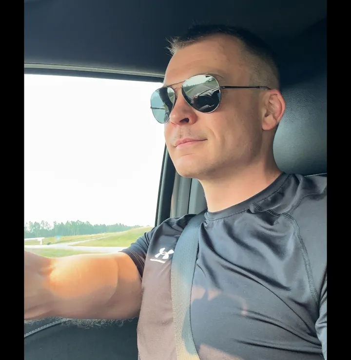 Chris Westlund in the cab of his truck