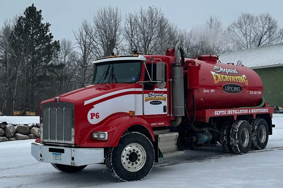 Shepard Excavating septic pump truck in winter