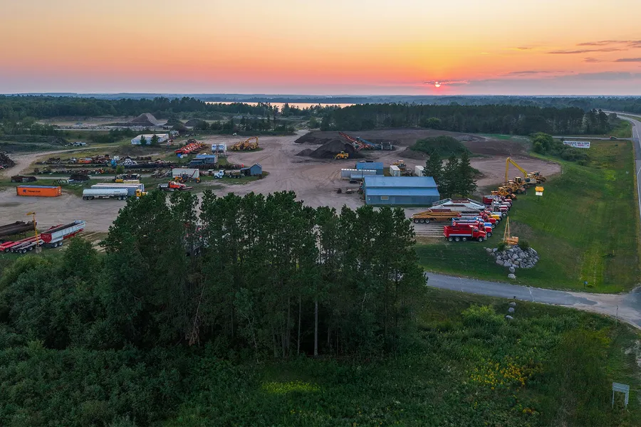 Aerial view of a gravel pit at sunset