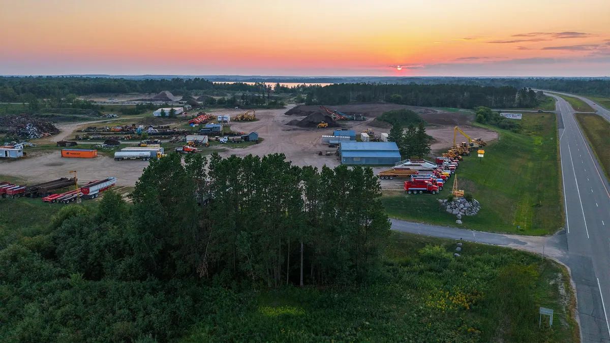 Aerial view of a gravel pit at sunset